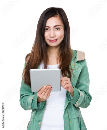 Asian woman use of the tablet pc © leungchopan