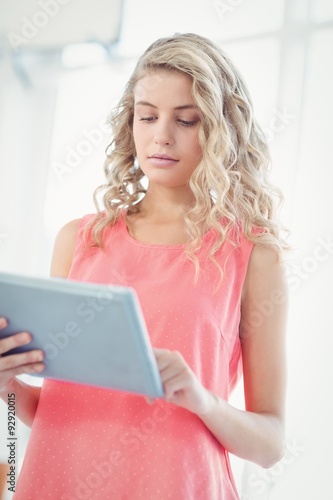 Woman using digital tablet 