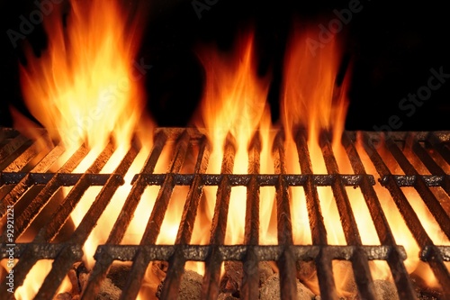 Empty BBQ Cast Iron Hot Grill With Burning Charcoal Fire
