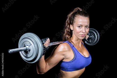 Portrait of fit woman lifting crossfit