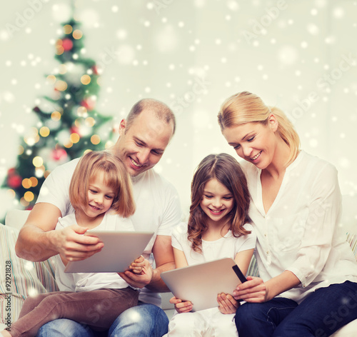 happy family with tablet pc computers at home