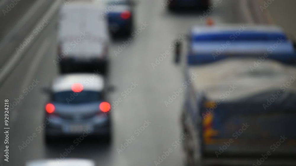 Urban rush hour scene with multiple cars in a traffic congestion Urban rush hour scene with multiple cars in a traffic congestion