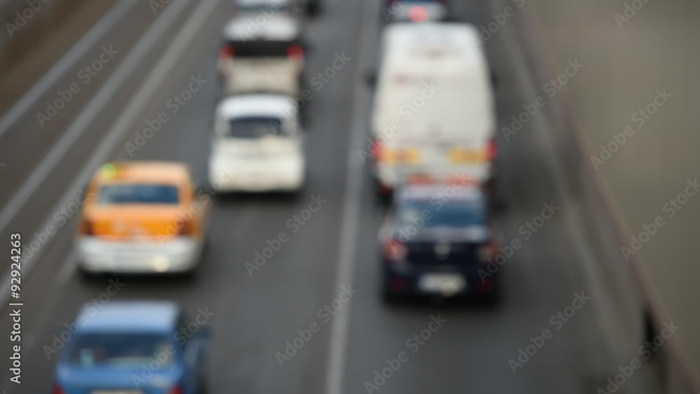 Urban rush hour scene with multiple cars in a traffic congestion Urban rush hour scene with multiple cars in a traffic congestion