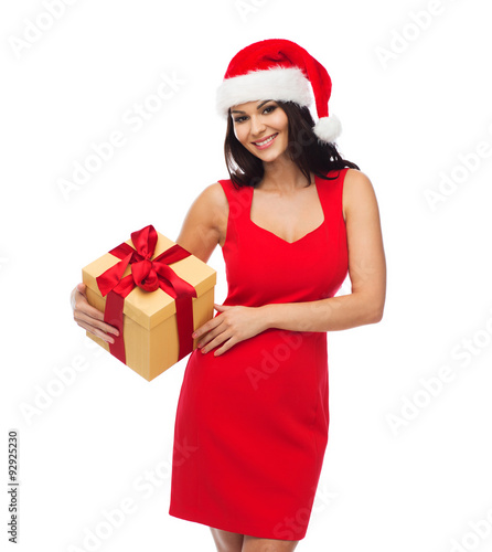 beautiful sexy woman in santa hat with gift box