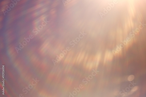soft warm light rays, sun glare background photo