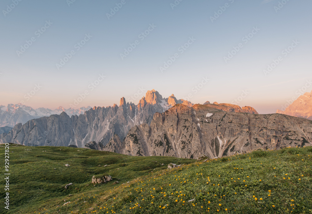 Obraz premium Mountains Panorama of the Dolomites at Sunrise with clouds