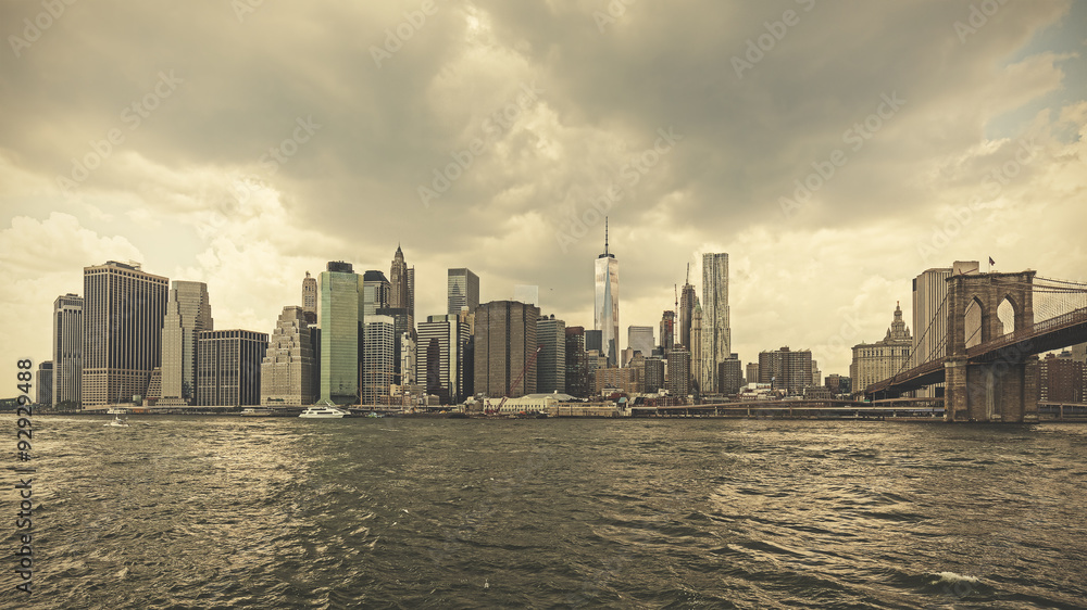 Retro toned stormy sky over Manhattan, NYC, USA.