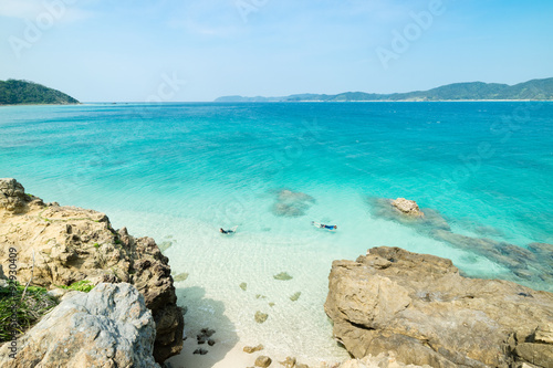 Tropical paradise island beach lagoon and white sand beach full of beautiful clear blue turquoise water in Amami Oshima, Kagoshima, Okinawa, Tropical Japan during Summer vacation