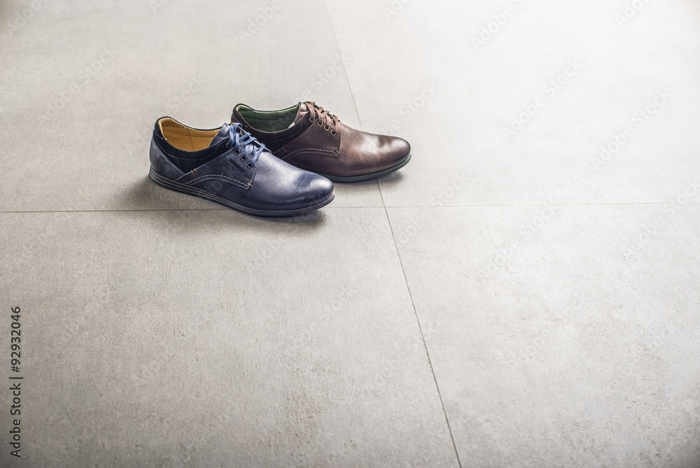Mens shoes on stone floor