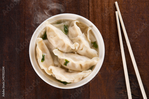 Top view Asian meal dumplings soup photo