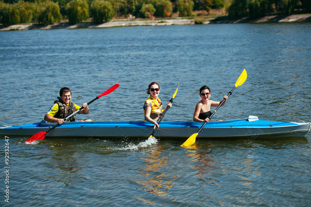 Young people in canoes. Family holiday.