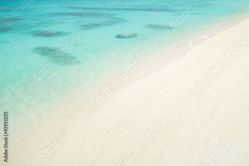 Tropical paradise island beach lagoon and white sand beach full of beautiful clear blue turquoise water in Amami Oshima, Kagoshima, Okinawa, Tropical Japan during Summer vacation © samspicerphoto
