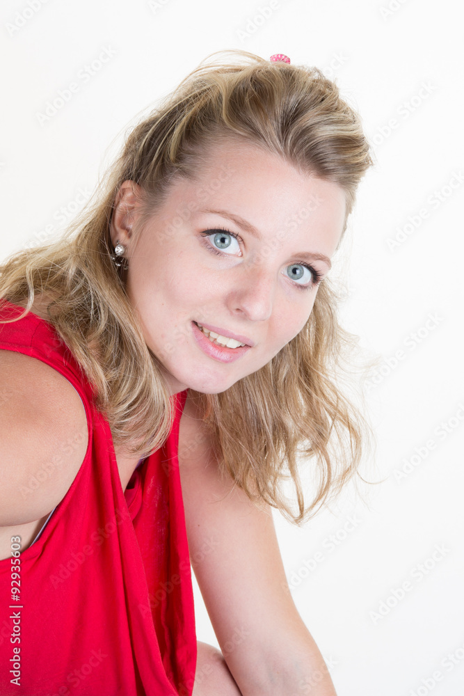Portrait of a young girl with grey top and blue eyes Portrait of a young girl with grey top and blue eyes