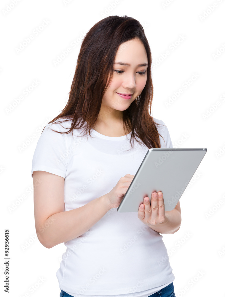 Young woman use of the tablet pc Young woman use of the tablet pc