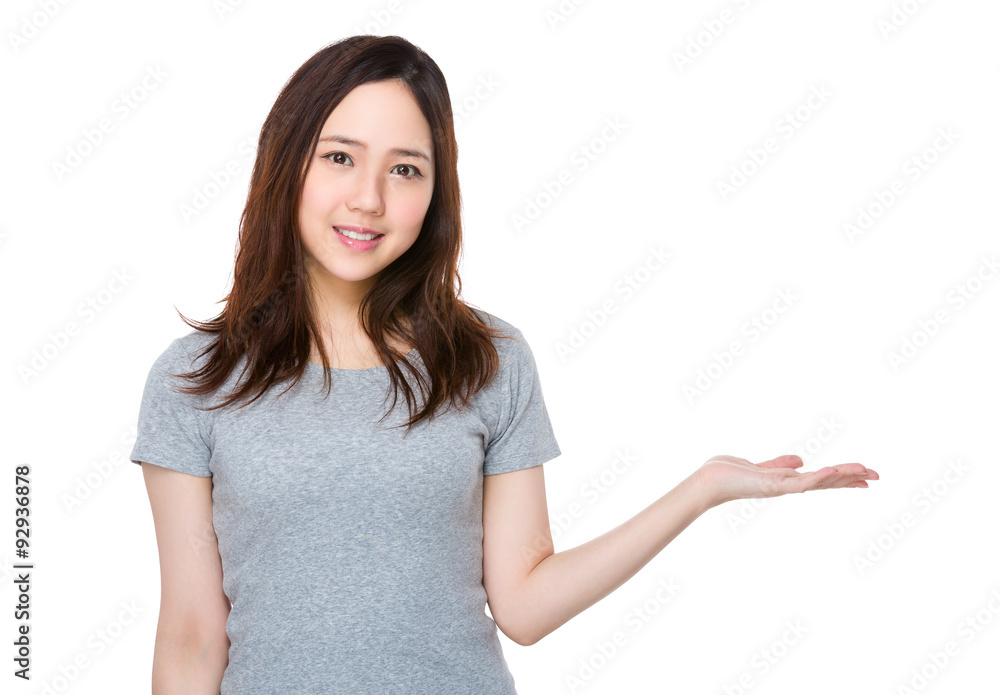 Asian woman showing open hand palm Asian woman showing open hand palm