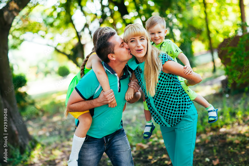 Happy family in the park. Happiness.