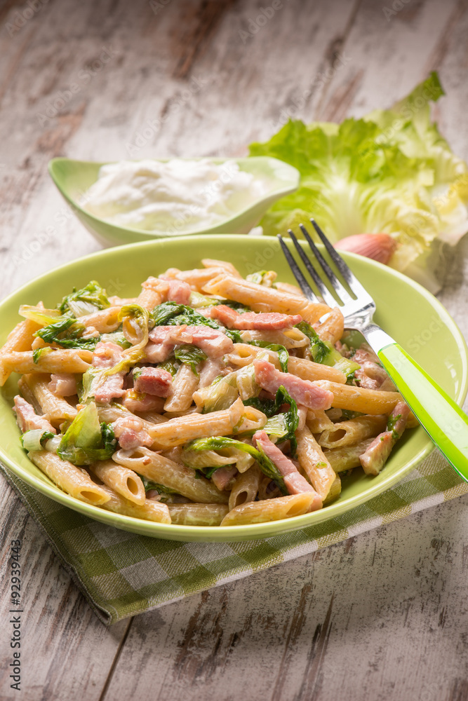 pasta with bacon lettuce and cream sauce, selective focus pasta with bacon lettuce and cream sauce, selective focus