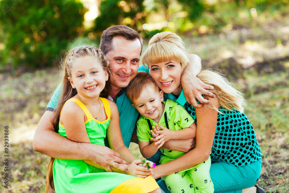 Fototapeta premium Happy family in the park. Happiness.