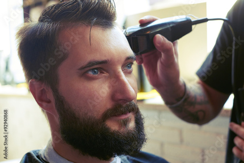 barber cutting hair