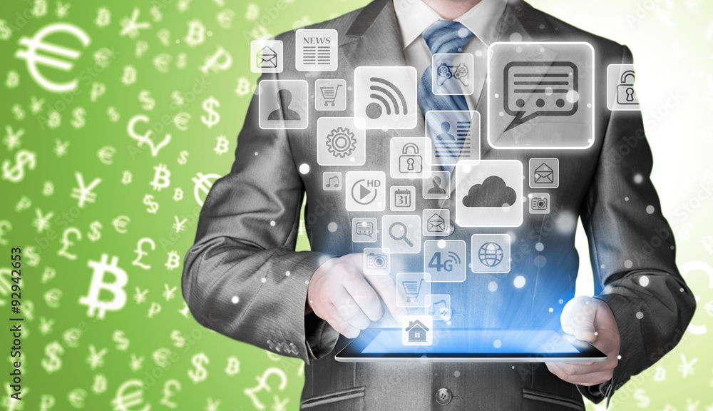 Business man using tablet PC with social media icon set Business man using tablet PC with social media icon set