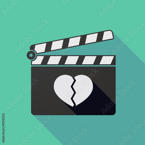 Long shadow clapper board with a broken heart