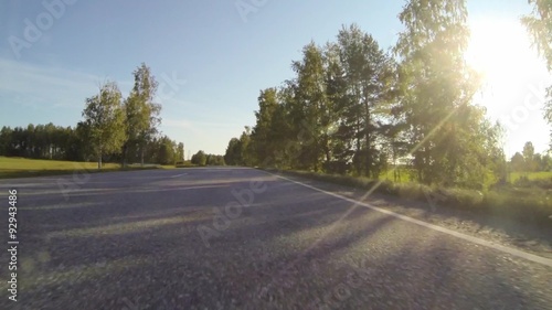 Wallpaper Mural Driving on countryside highway with trees and green fields in Torontodigital.ca