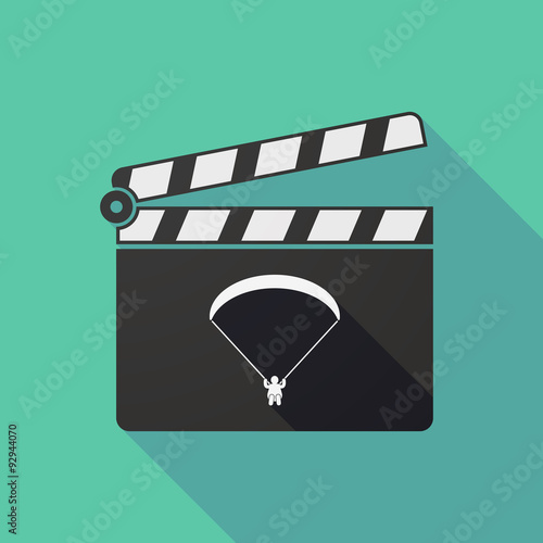 Long shadow clapper board with a paraglider