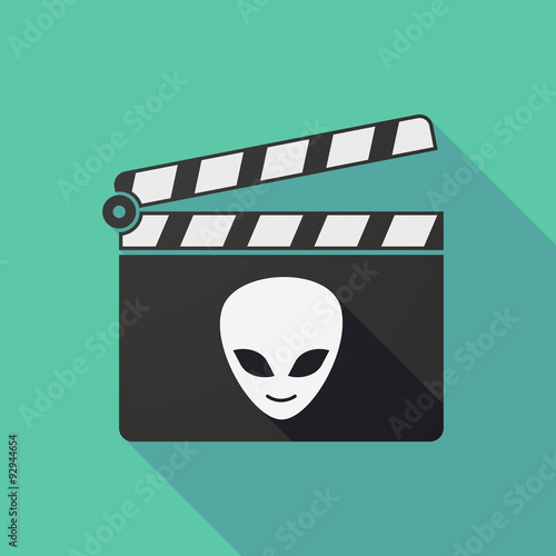 Long shadow clapper board with an alien face