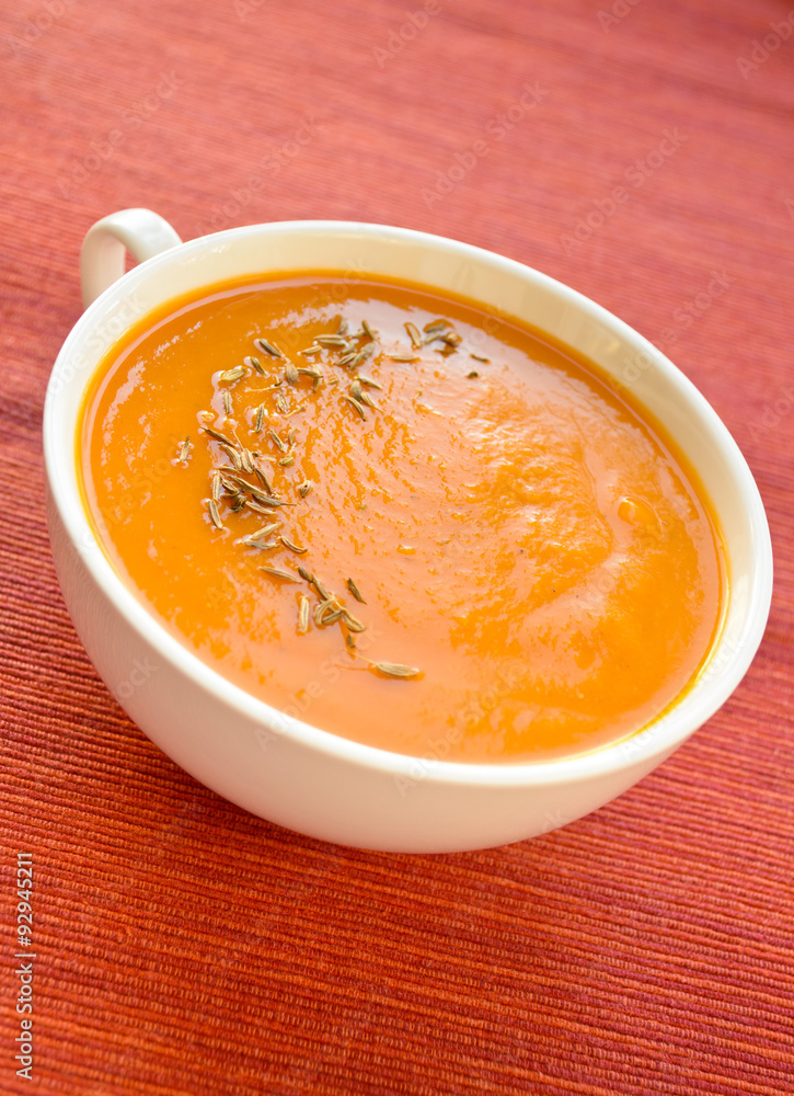 Vegetarian carrot-pumpkin cream soup with garlic and cumin Vegetarian carrot-pumpkin cream soup with garlic and cumin
