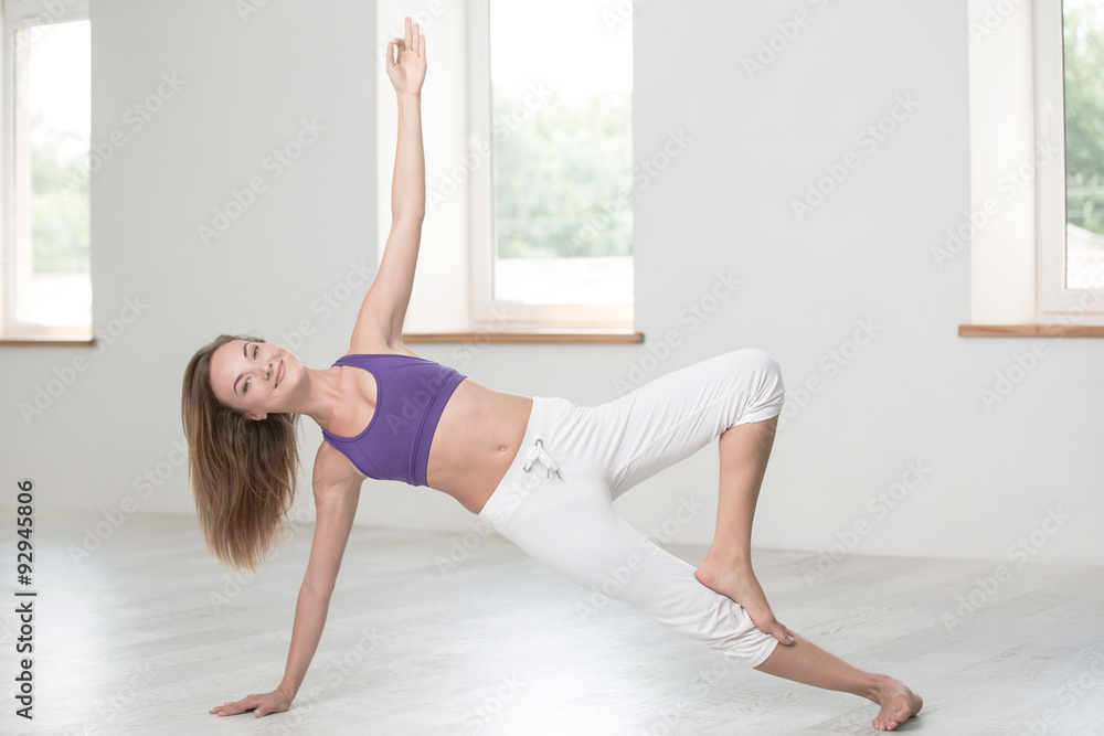 Happy woman doing yoga exercises Happy woman doing yoga exercises