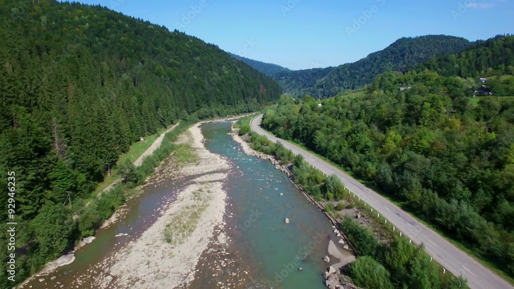 Aerial: flight above mountain river Aerial: flight above mountain river