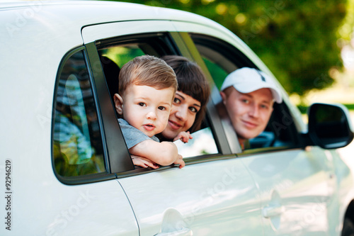 Happy family at the new car. Automobile.