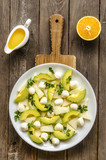 Salad with melon and avocado mini mozzarella orange-honey dressing     