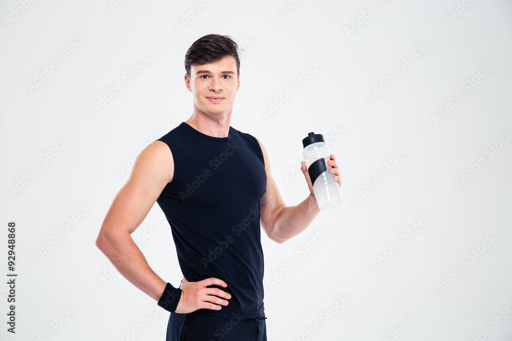 Happy sports man holding bottle with water Happy sports man holding bottle with water