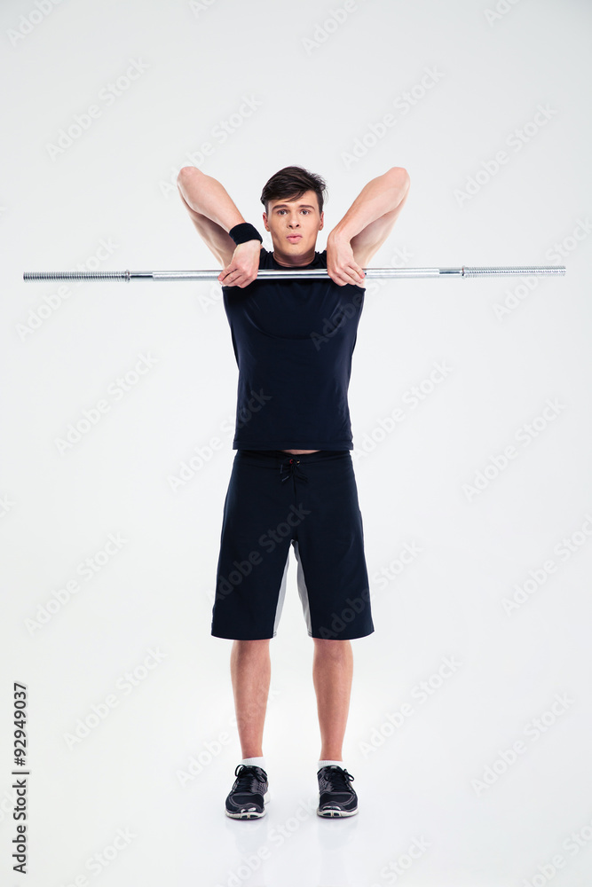Athletic man workout with barbell