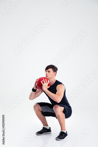 Sports man workout with fitness ball