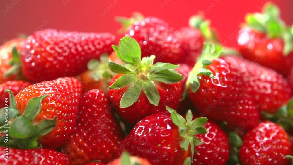 Fresh ripe strawberry over red. Food frame background Fresh ripe strawberry over red. Food frame background