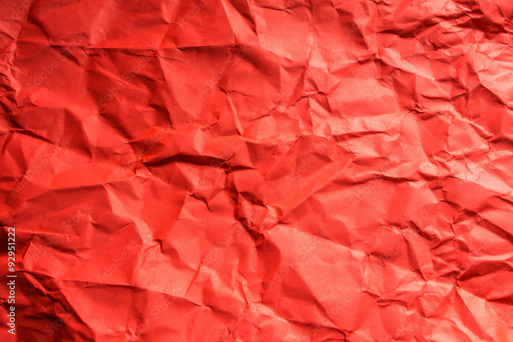 Fototapeta premium Crumpled red paper background