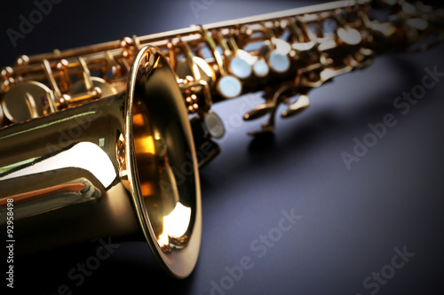Tela Golden saxophone on dark background