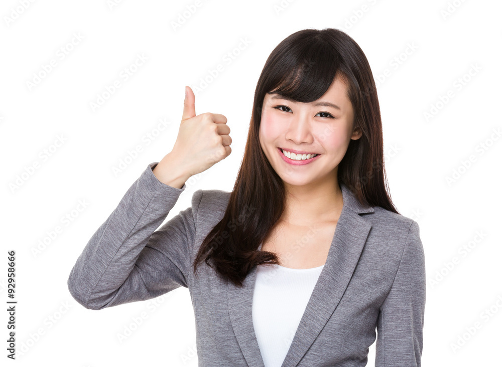 Asian Young businesswoman showing htumb up gesture Asian Young businesswoman showing htumb up gesture
