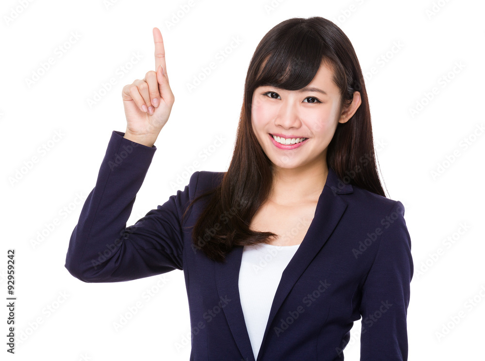 Asian businesswoman showing finger point up Asian businesswoman showing finger point up