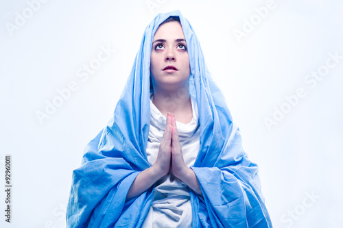 Virgin Mary with Blue Veil Praying on White Background