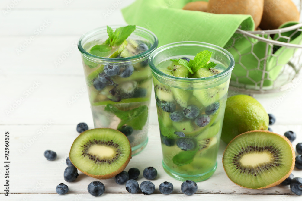 Fototapeta premium Kiwi and Blueberry cocktails on wooden background