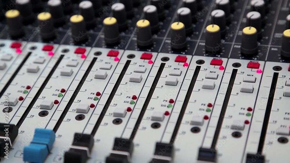 Audio production console in audio recording studio