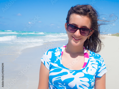 Pretty girl at beautiful Varadero beach in Cuba © kmiragaya