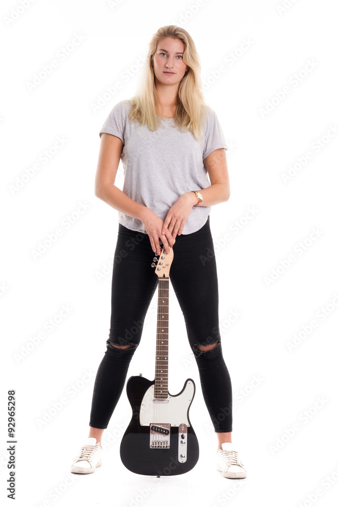 Junges blondes Mädchen mit einer E-Gitarre Junges blondes Mädchen mit einer E-Gitarre