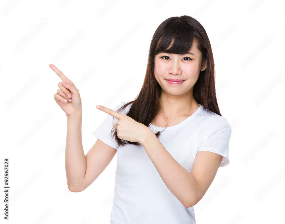 Young woman with two finger point up Young woman with two finger point up