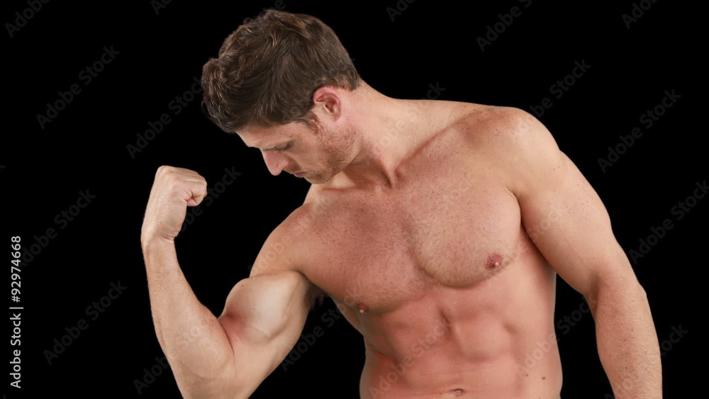 Muscular man flexing his muscles Muscular man flexing his muscles