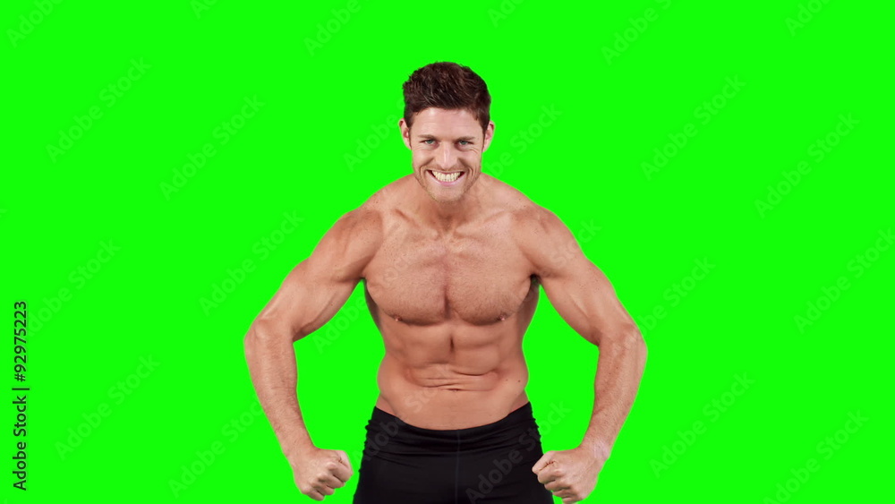 Muscular man flexing his muscles Muscular man flexing his muscles