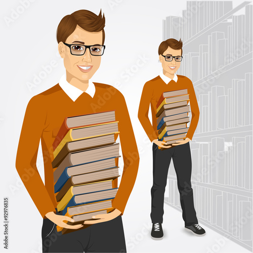young student holding stack of books